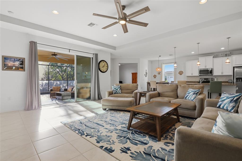 14879 Wichita Road Port Charlotte, FL 33981 - Photo 5 of 45 a living room with furniture and a large window