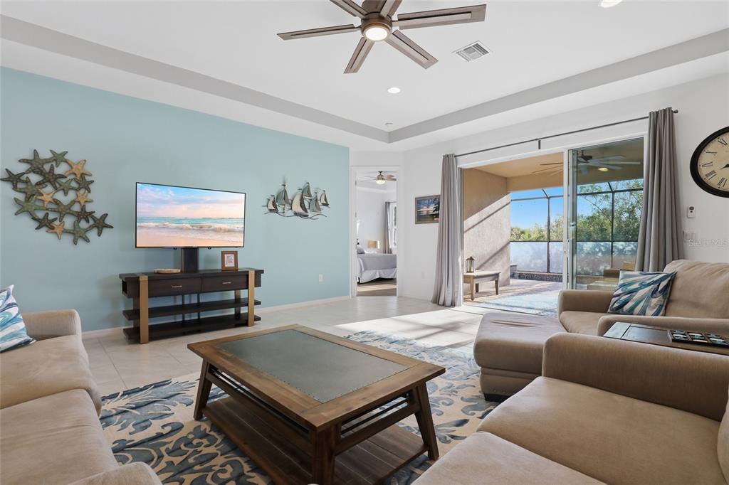 14879 Wichita Road Port Charlotte, FL 33981 - Photo 6 of 45 a living room with furniture and a large window