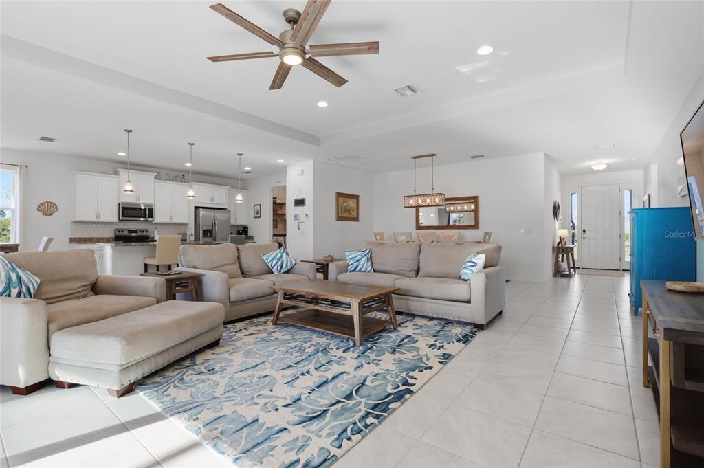 14879 Wichita Road Port Charlotte, FL 33981 - Photo 8 of 45 a living room with furniture and a view of kitchen