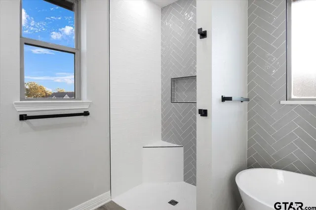 an aerial view of a house with a ocean view