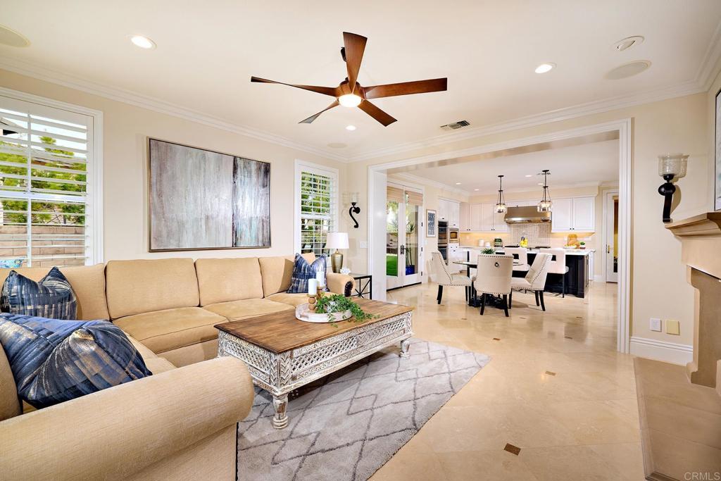 6895 Amber Lane Carlsbad, CA 92009 - Photo 16 of 45 a living room with furniture and wooden floor