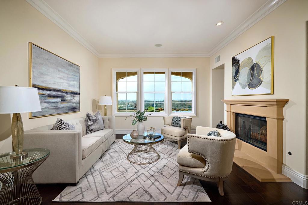 6895 Amber Lane Carlsbad, CA 92009 - Photo 18 of 45 a living room with furniture and a fireplace