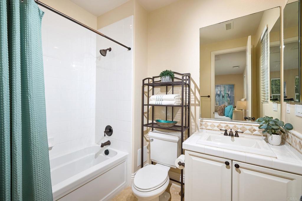 6895 Amber Lane Carlsbad, CA 92009 - Photo 24 of 45 a bathroom with a sink toilet and shower