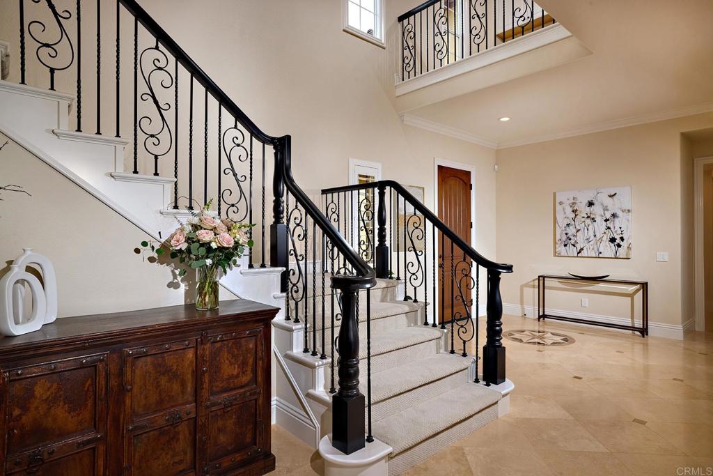 6895 Amber Lane Carlsbad, CA 92009 - Photo 25 of 45 a view of entryway livingroom and hall
