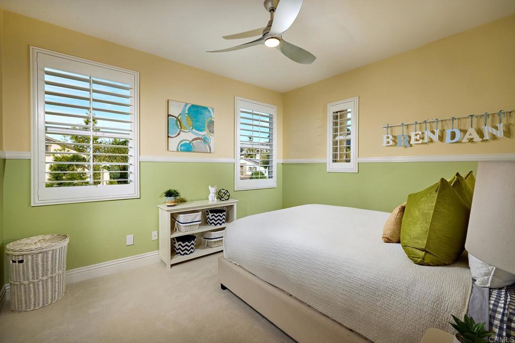 6895 Amber Lane Carlsbad, CA 92009 - Photo 33 of 45 a bedroom with a bed and a window