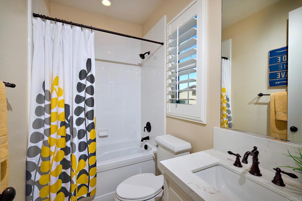 6895 Amber Lane Carlsbad, CA 92009 - Photo 34 of 45 a bathroom with a sink toilet and shower