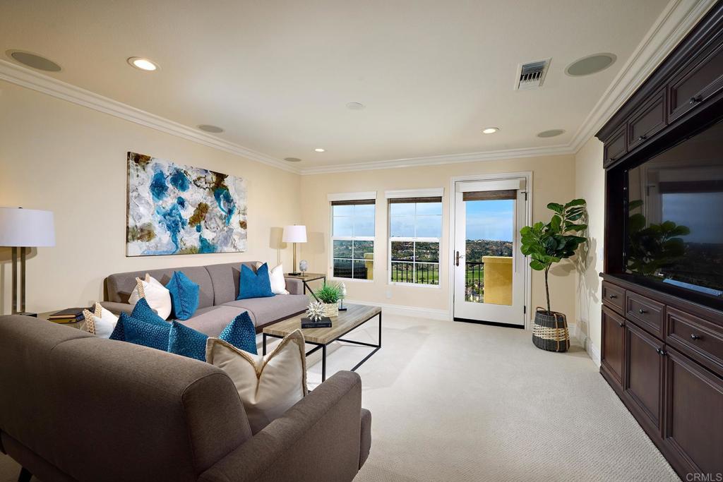 6895 Amber Lane Carlsbad, CA 92009 - Photo 36 of 45 a living room with furniture large window and flat screen tv