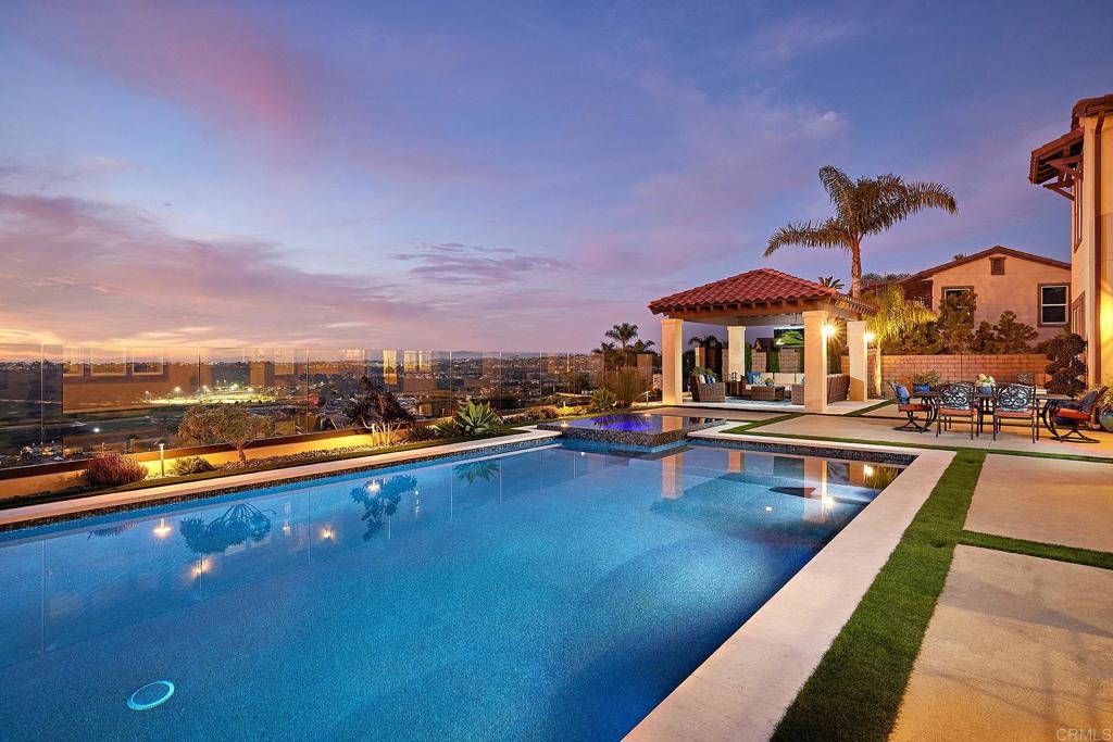 6895 Amber Lane Carlsbad, CA 92009 - Photo 6 of 45 swimming pool view with a seating space and a ocean view in the background
