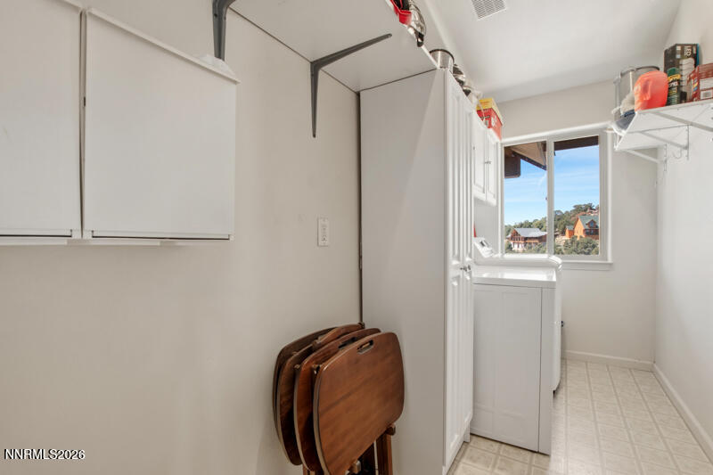 1367 Calavaras Road Reno, NV 89521 - Photo 8 of 26 a bathroom with a sink and a mirror