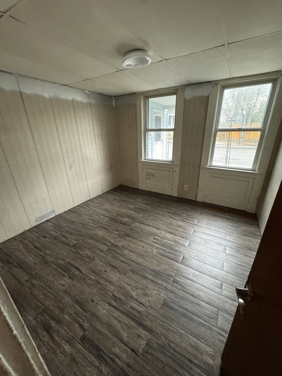 731 Bay Street Fall River, MA 02724 - Photo 11 of 12 an empty room with wooden floor and windows