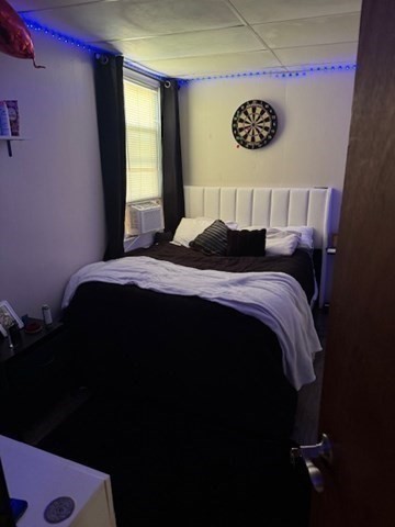 731 Bay Street Fall River, MA 02724 - Photo 8 of 12 a bedroom with a bed and a window