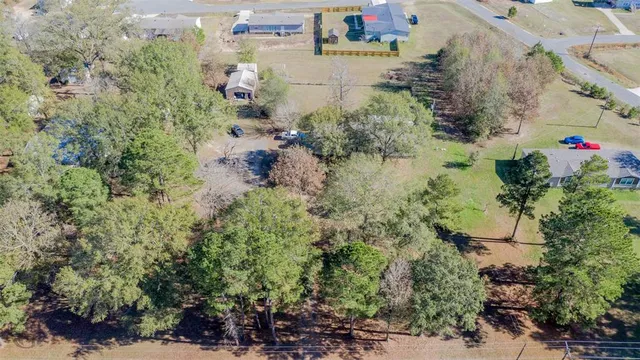 an aerial view of residential house with outdoor space