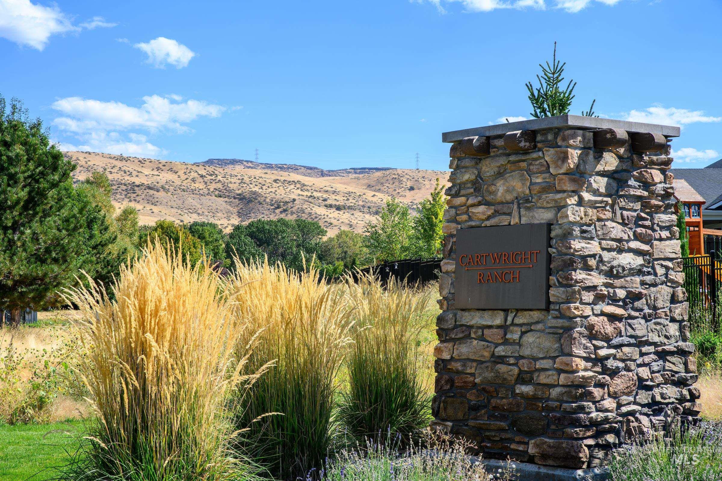 3374 West Neville Rnch Drive Boise, ID 83714 - Photo 10 of 37 Community sign with a mountain view
