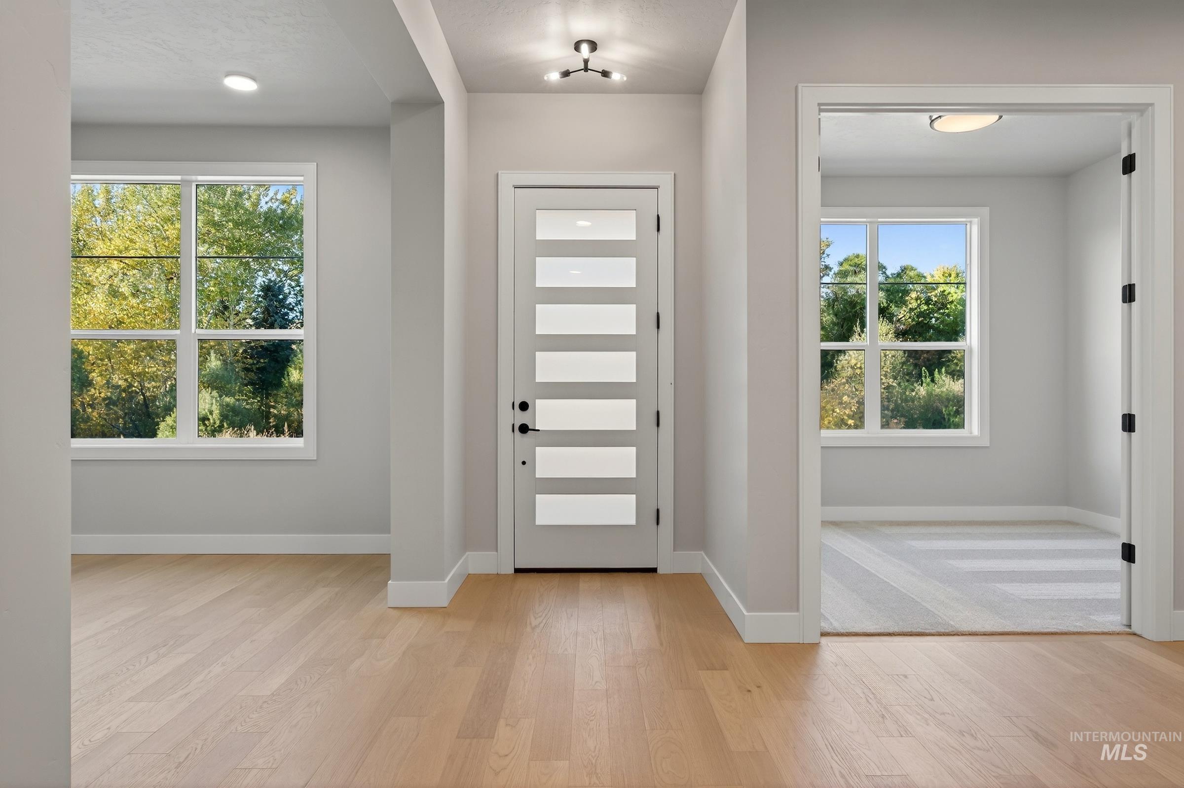 3374 West Neville Rnch Drive Boise, ID 83714 - Photo 7 of 37 Foyer featuring light wood-type flooring and recessed lighting