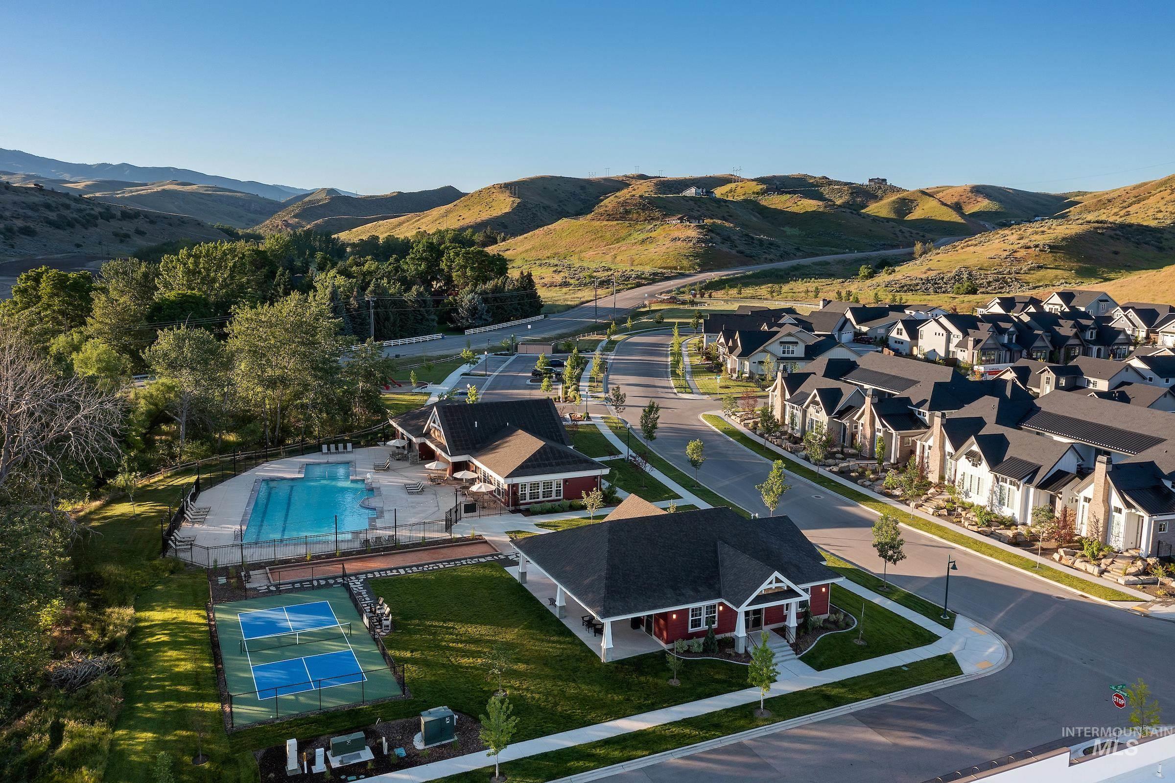 3374 West Neville Rnch Drive Boise, ID 83714 - Photo 8 of 37 Bird's eye view of a mountainous background and a pool