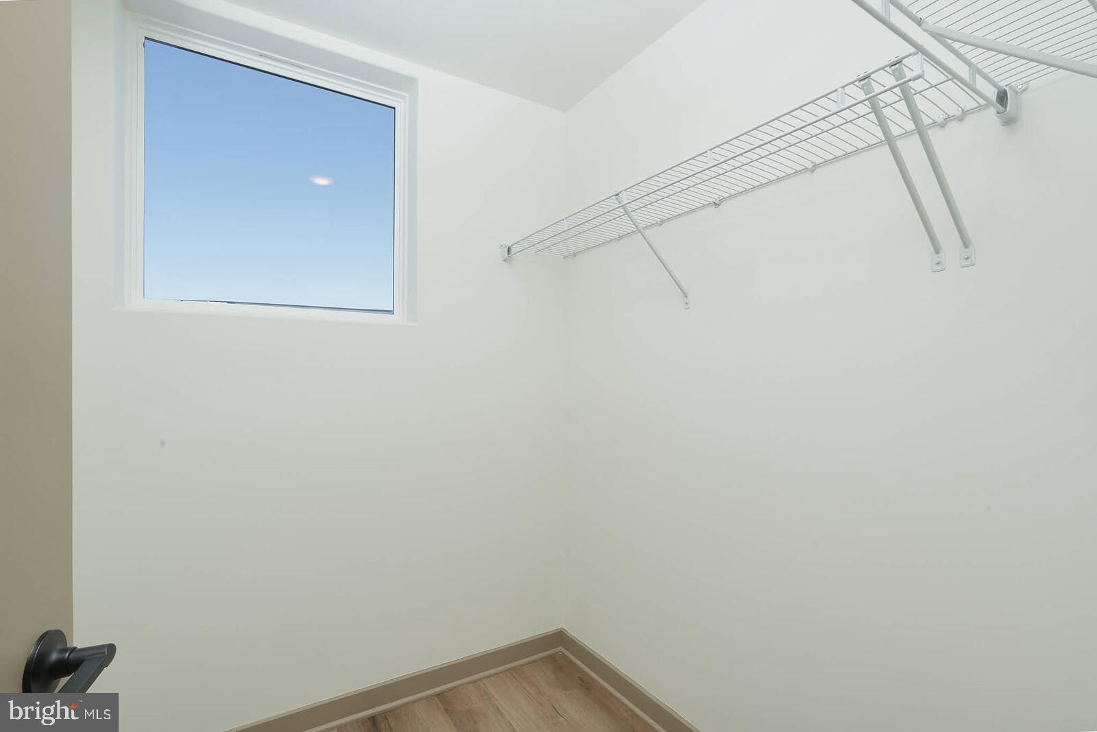 710 D Iron Frg Road Frederick, MD 21702 - Photo 27 of 43 a view of small space with empty racks on the wall
