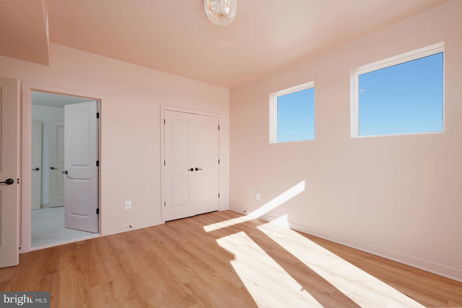 710 D Iron Frg Road Frederick, MD 21702 - Photo 36 of 43 a view of a room with wooden floor