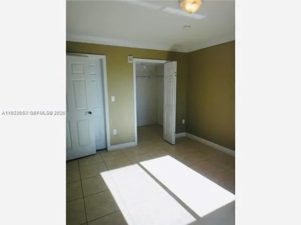 a view of a hallway with entryway