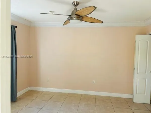 a bathroom with a granite countertop sink mirror toilet and bathtub
