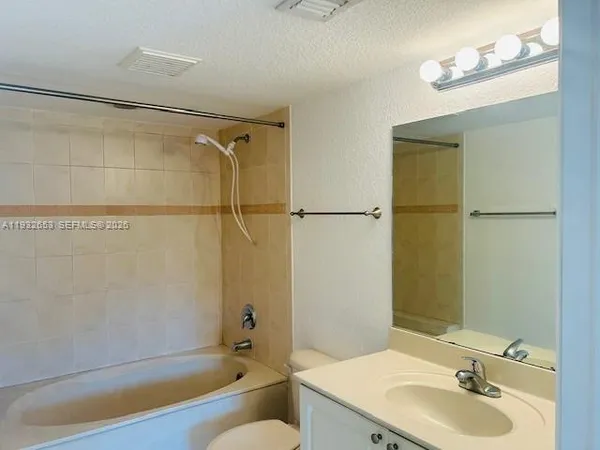 a view of a hallway with a glass door