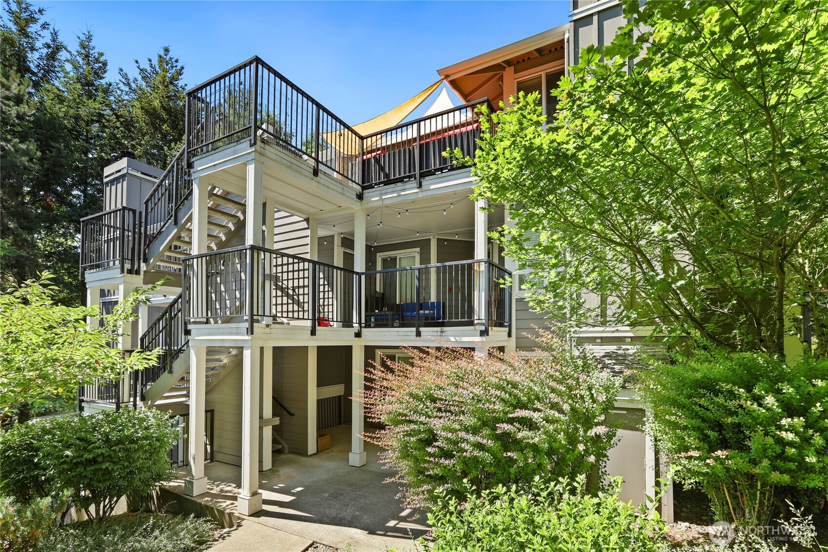 front view of a house with a tree