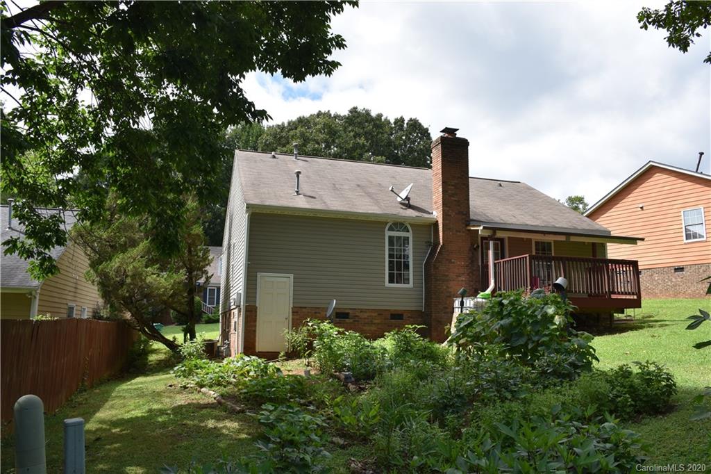 7121 Rena Mae Lane Charlotte, NC 28227 - Photo 5 of 21 front view of house with a small yard