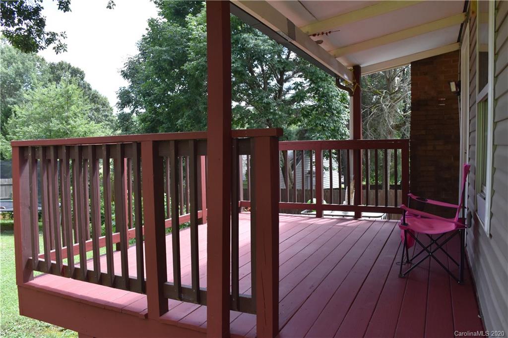 7121 Rena Mae Lane Charlotte, NC 28227 - Photo 7 of 21 a view of balcony with wooden floor and outdoor seating