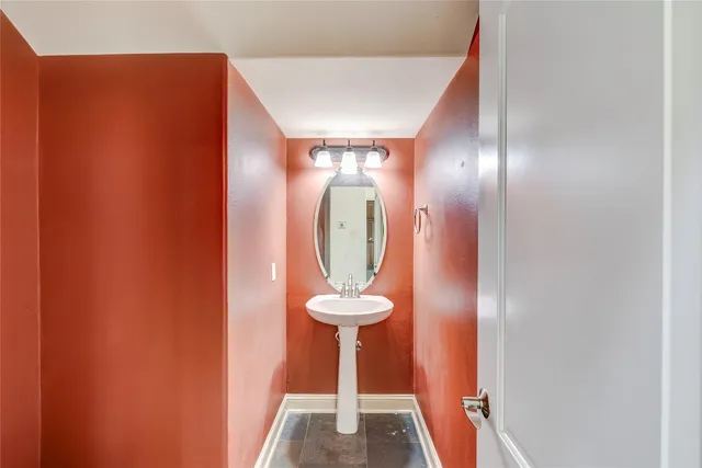 a kitchen with stainless steel appliances a refrigerator and a stove top oven