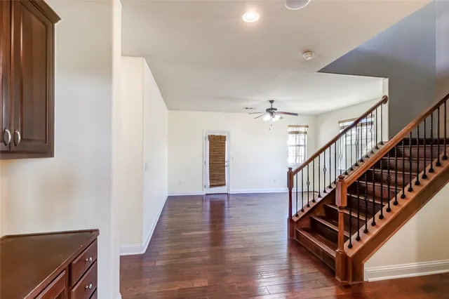 a view of a hallway with front door