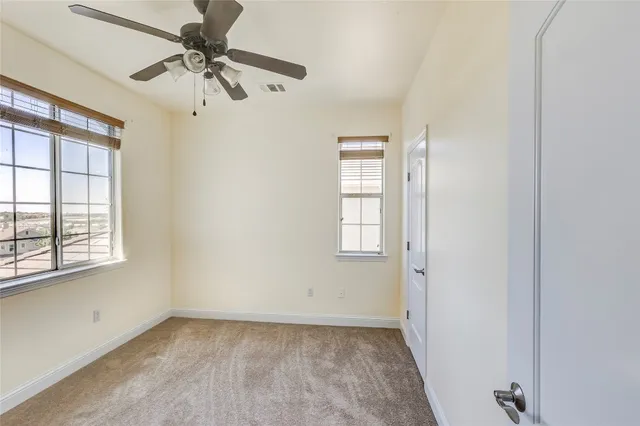 a bathroom with a sink vanity and a mirror
