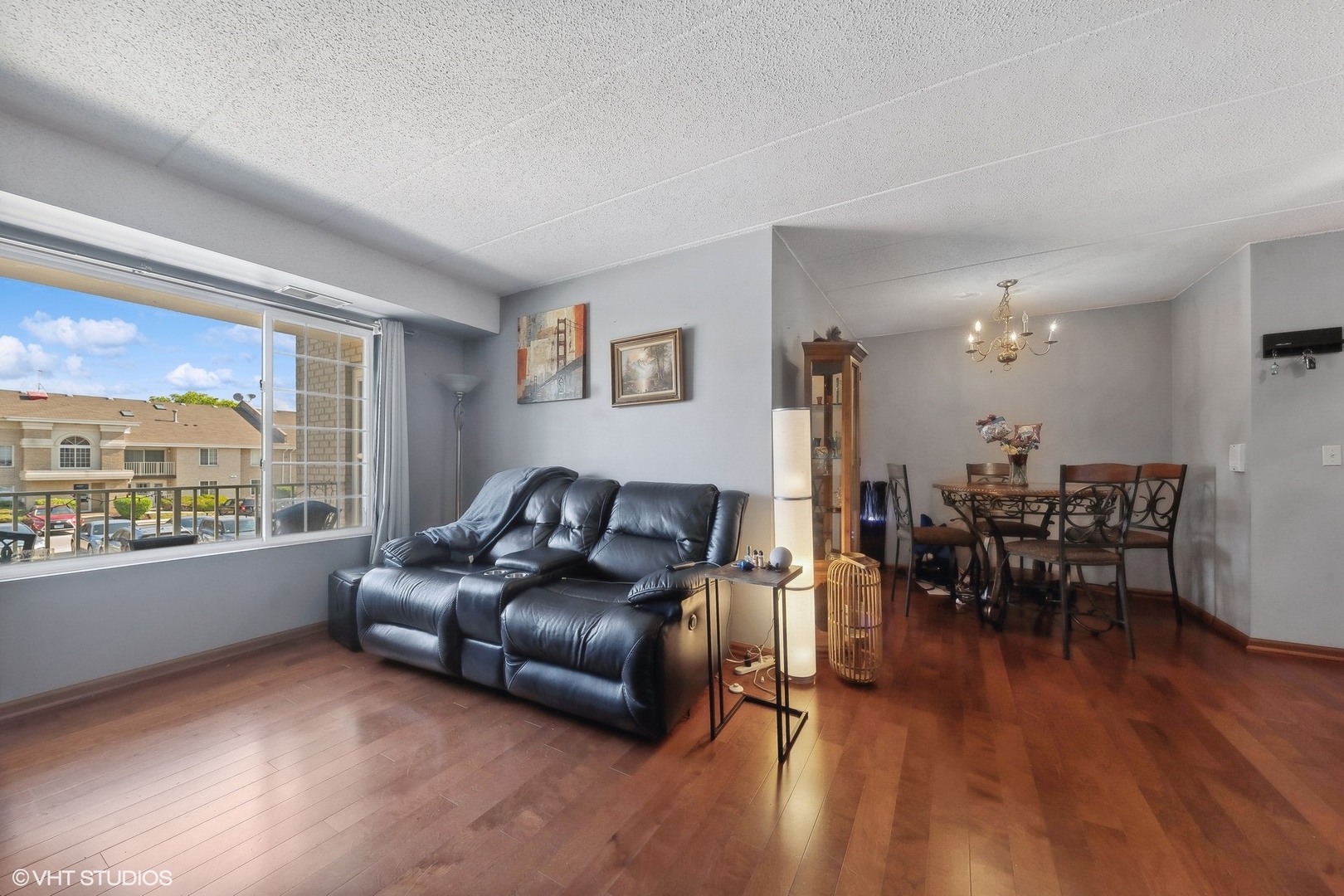 4232 West 77th Street, Unit 206 Chicago, IL 60652 - Photo 5 of 17 a living room with furniture and a large window