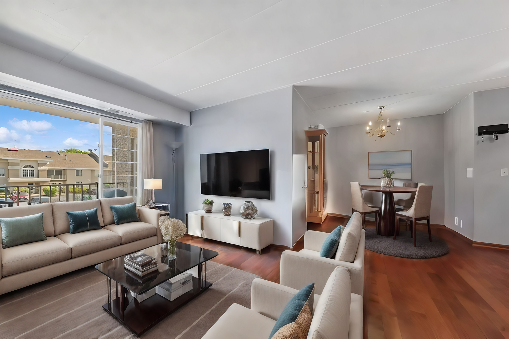 4232 West 77th Street, Unit 206 Chicago, IL 60652 - Photo 6 of 17 a living room with furniture wooden floor and a flat screen tv