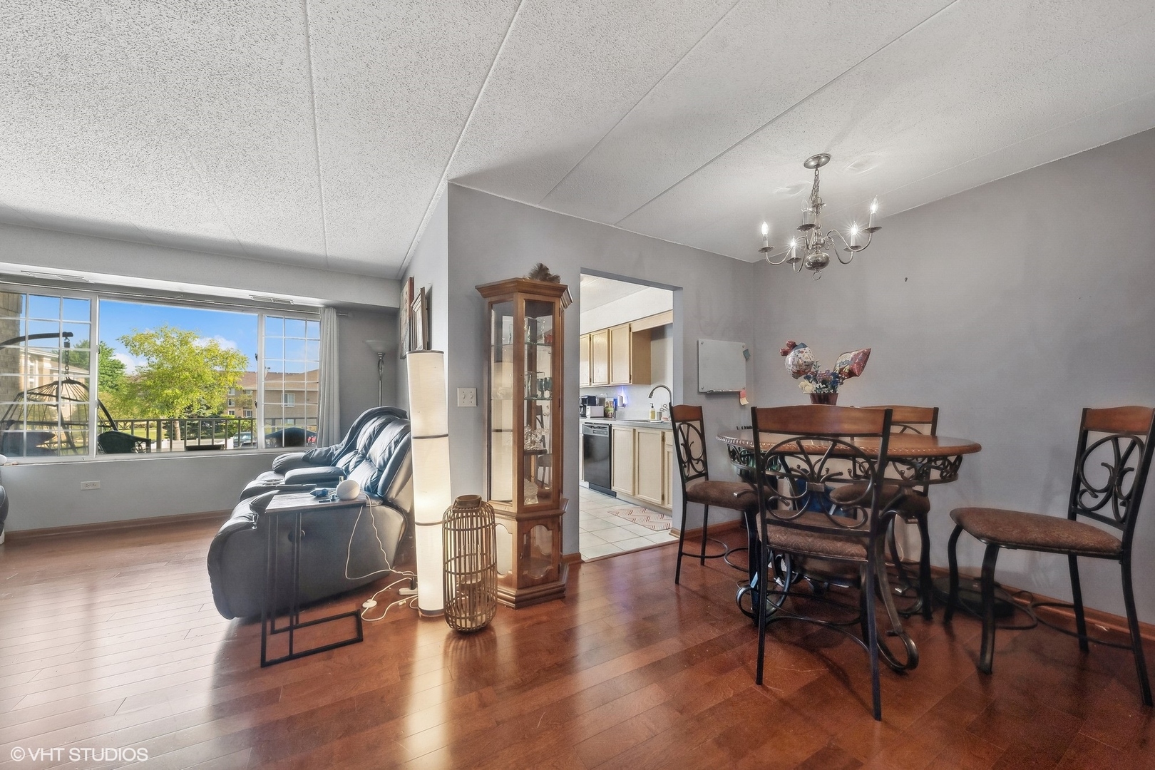 4232 West 77th Street, Unit 206 Chicago, IL 60652 - Photo 10 of 17 a view of a dining room with furniture window and outside view