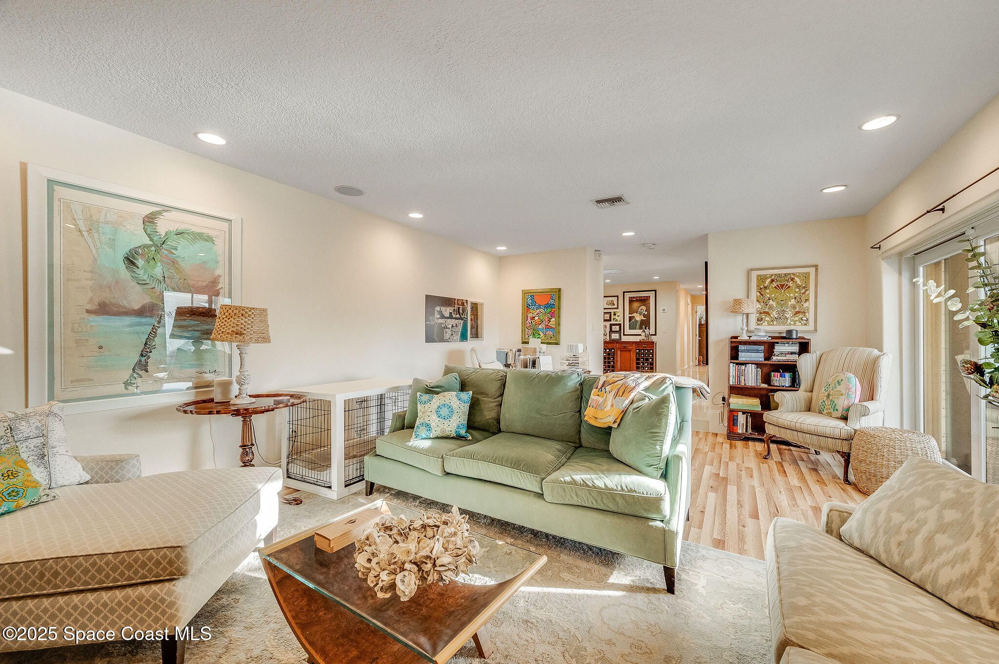 1480 West Riviera Drive Merritt Island, FL 32952 - Photo 24 of 93 a living room with furniture and a table