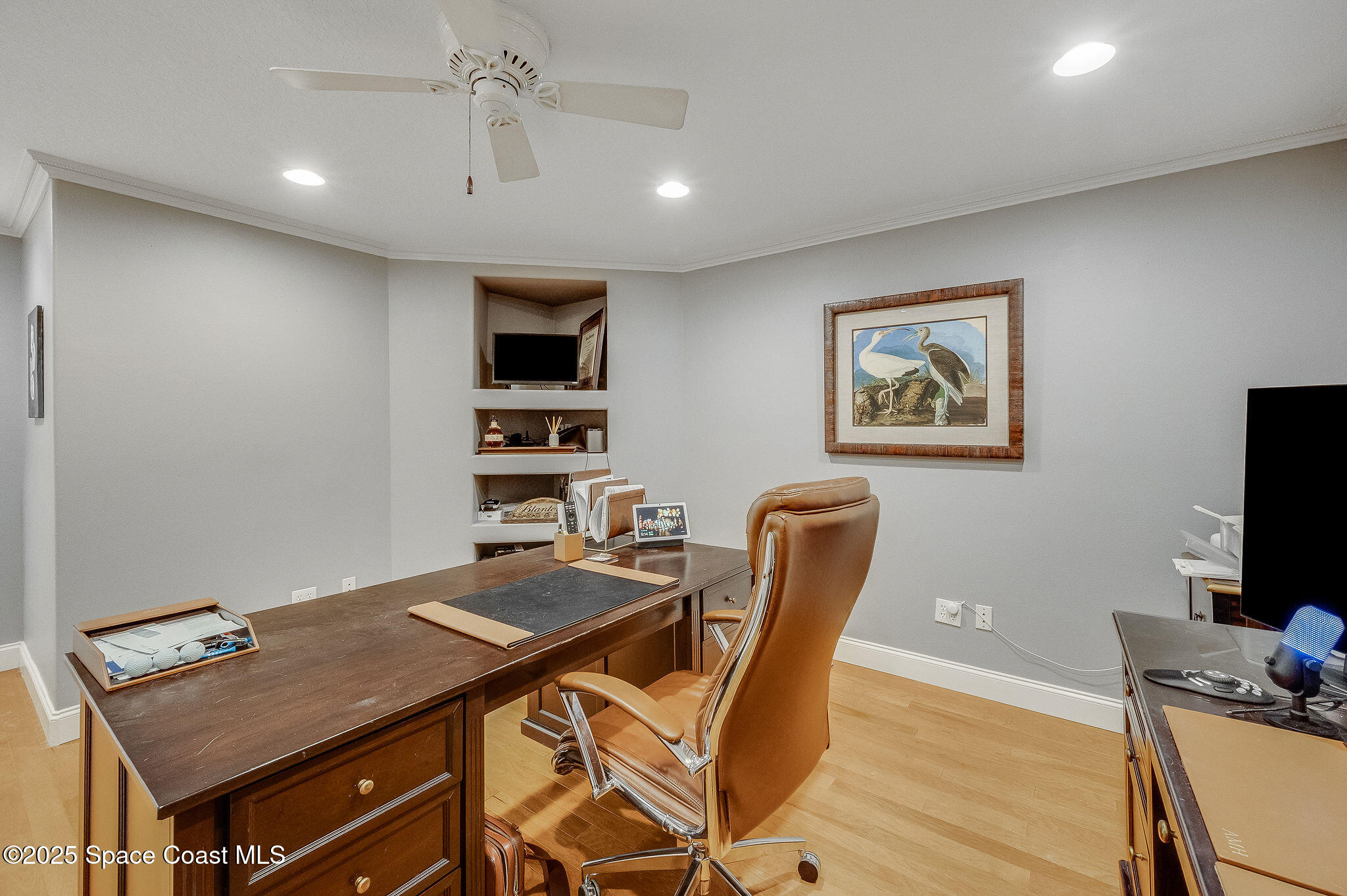 1480 West Riviera Drive Merritt Island, FL 32952 - Photo 46 of 93 a workspace with furniture and wooden floor