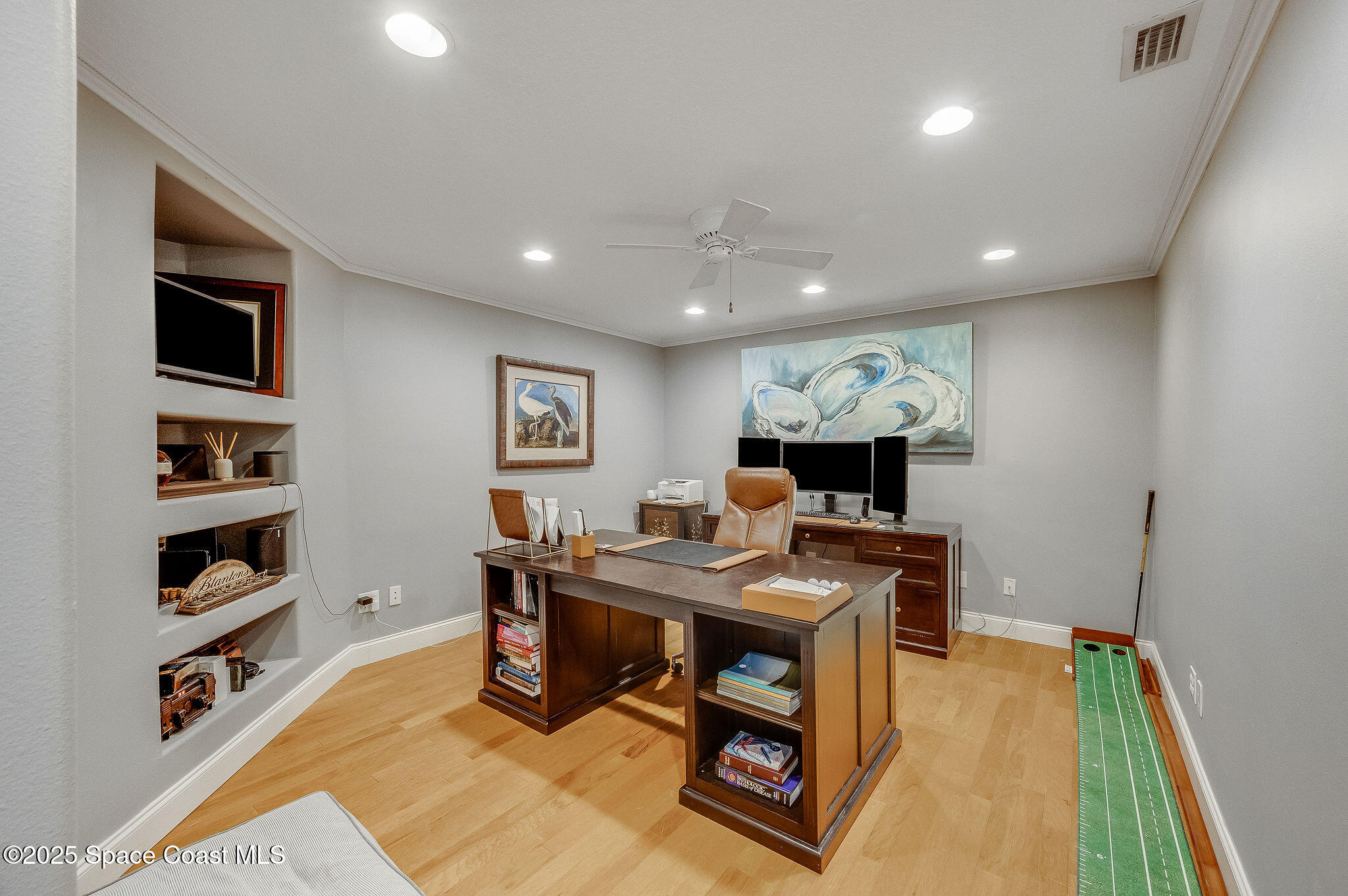 1480 West Riviera Drive Merritt Island, FL 32952 - Photo 47 of 93 a workspace with furniture
