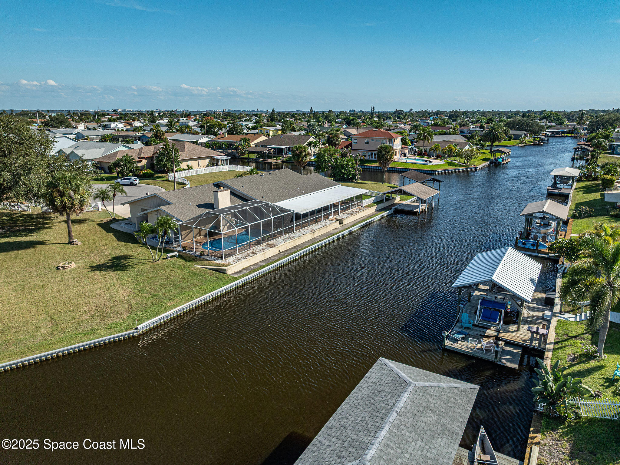 1480 West Riviera Drive Merritt Island, FL 32952 - Photo 79 of 93 an aerial view of residential houses with outdoor space