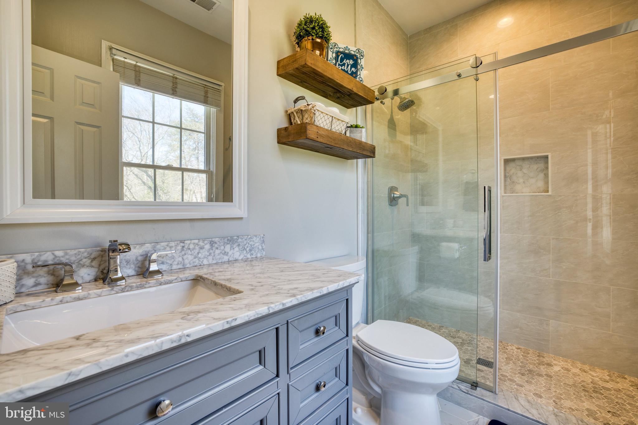 11110 Stuart Mill Road Oakton, VA 22124 - Photo 46 of 71 Bedroom #2 en suite bath. Remodeled 2021