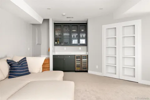 a living room with furniture and window