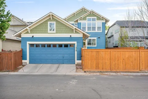 a front view of a house with a garage