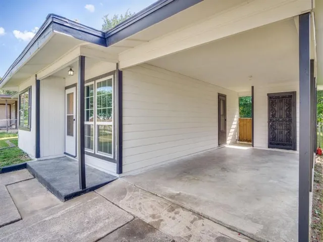 a view of a house with a porch