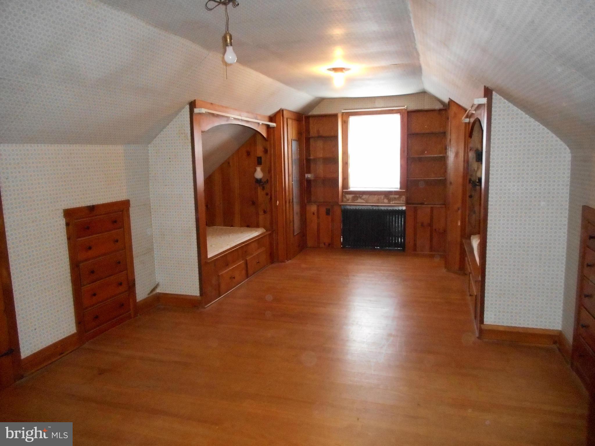 6403 Crestwood Road Baltimore, MD 21239 - Photo 10 of 15 a view of livingroom with furniture and window