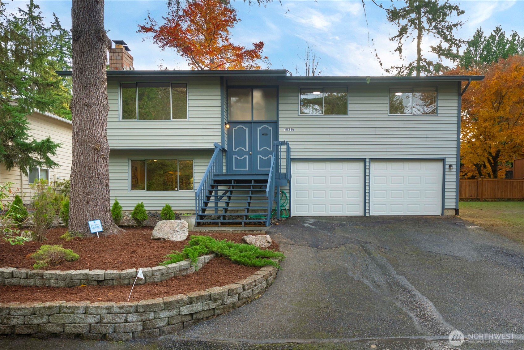 10316 Northeast 202nd Street Bothell, WA 98011 - Photo 3 of 40 front view of a house with a yard