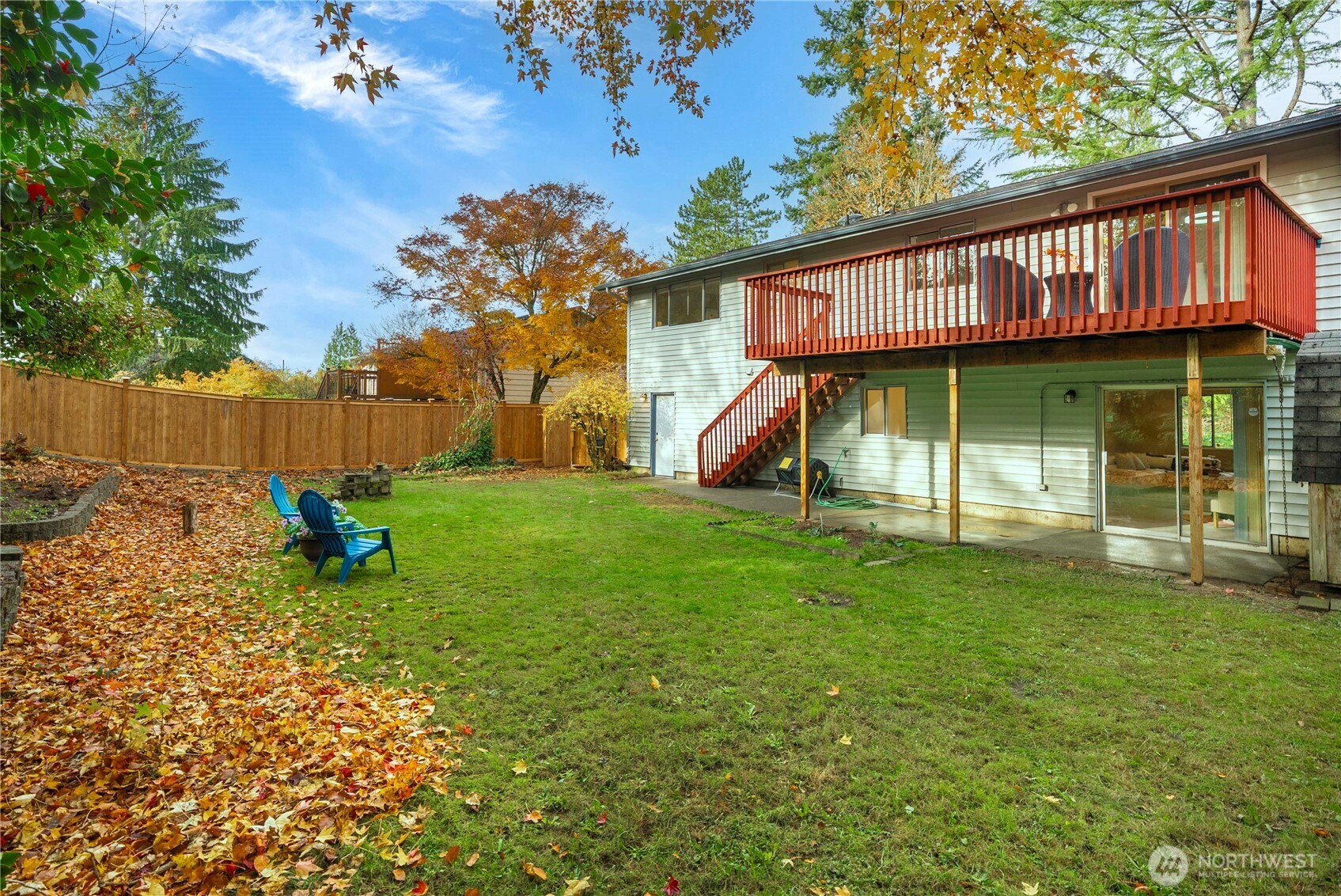 10316 Northeast 202nd Street Bothell, WA 98011 - Photo 34 of 40 a view of a house with a yard porch and sitting area