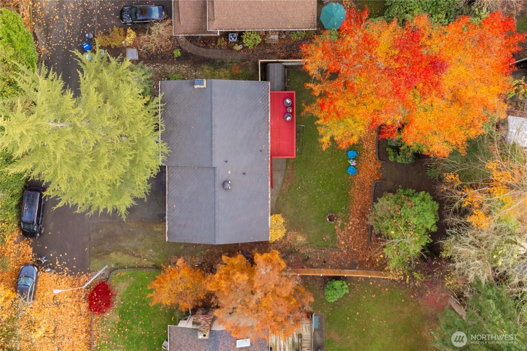10316 Northeast 202nd Street Bothell, WA 98011 - Photo 4 of 40 an aerial view of residential houses with outdoor space