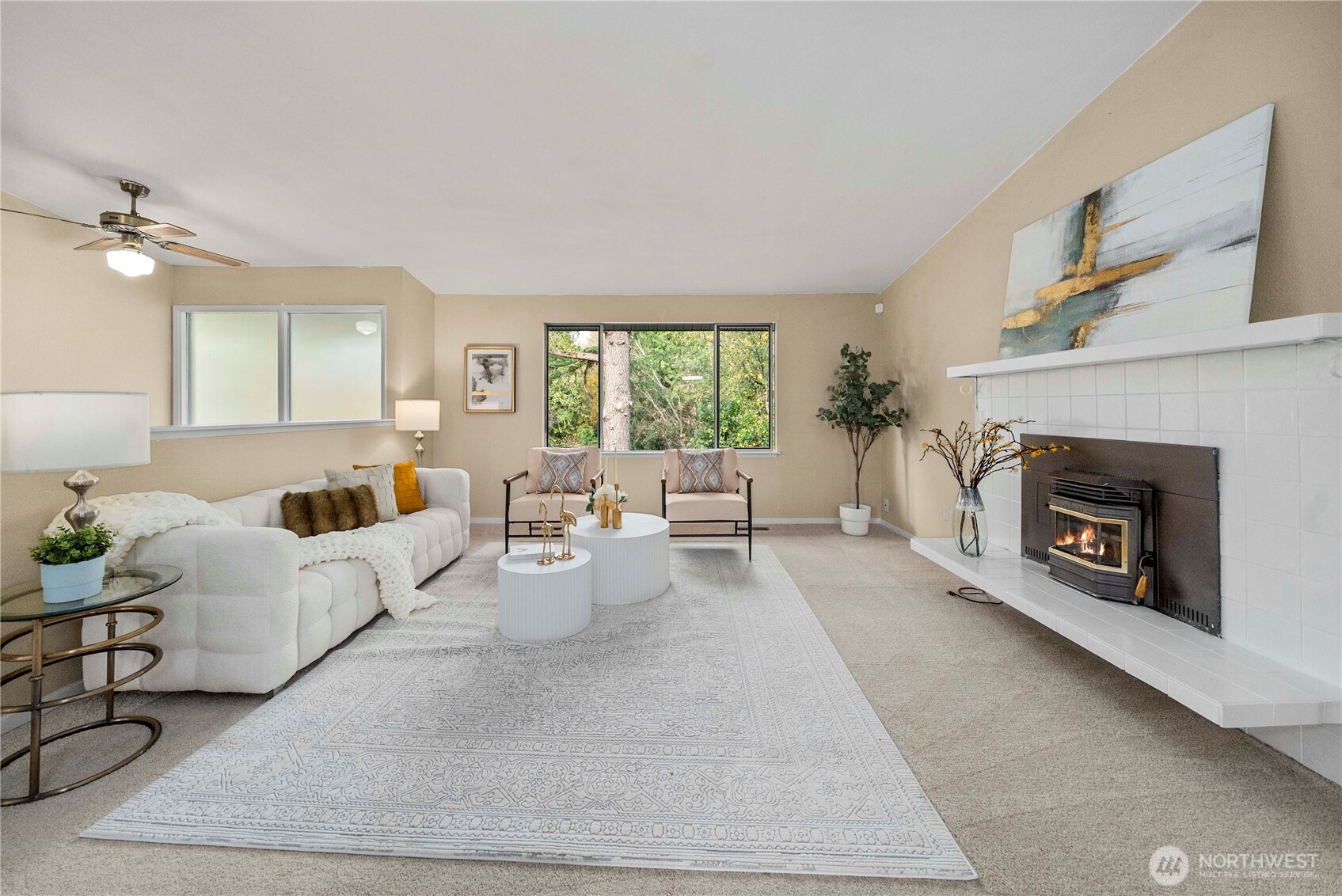10316 Northeast 202nd Street Bothell, WA 98011 - Photo 5 of 40 a living room with furniture large window and a fireplace