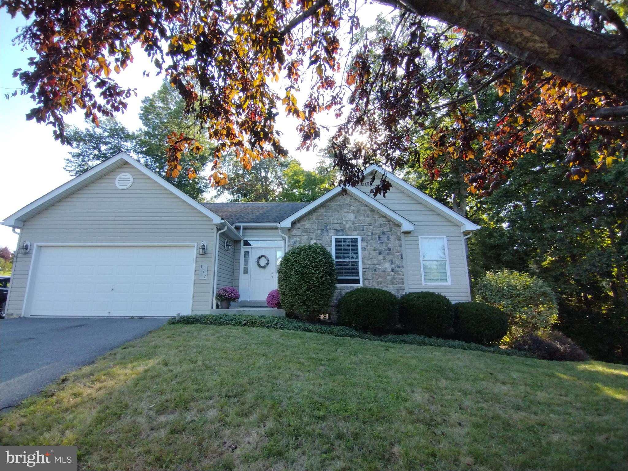 177 Raft Court Inwood, WV 25428 - Photo 1 of 40 a front view of house with yard and trees