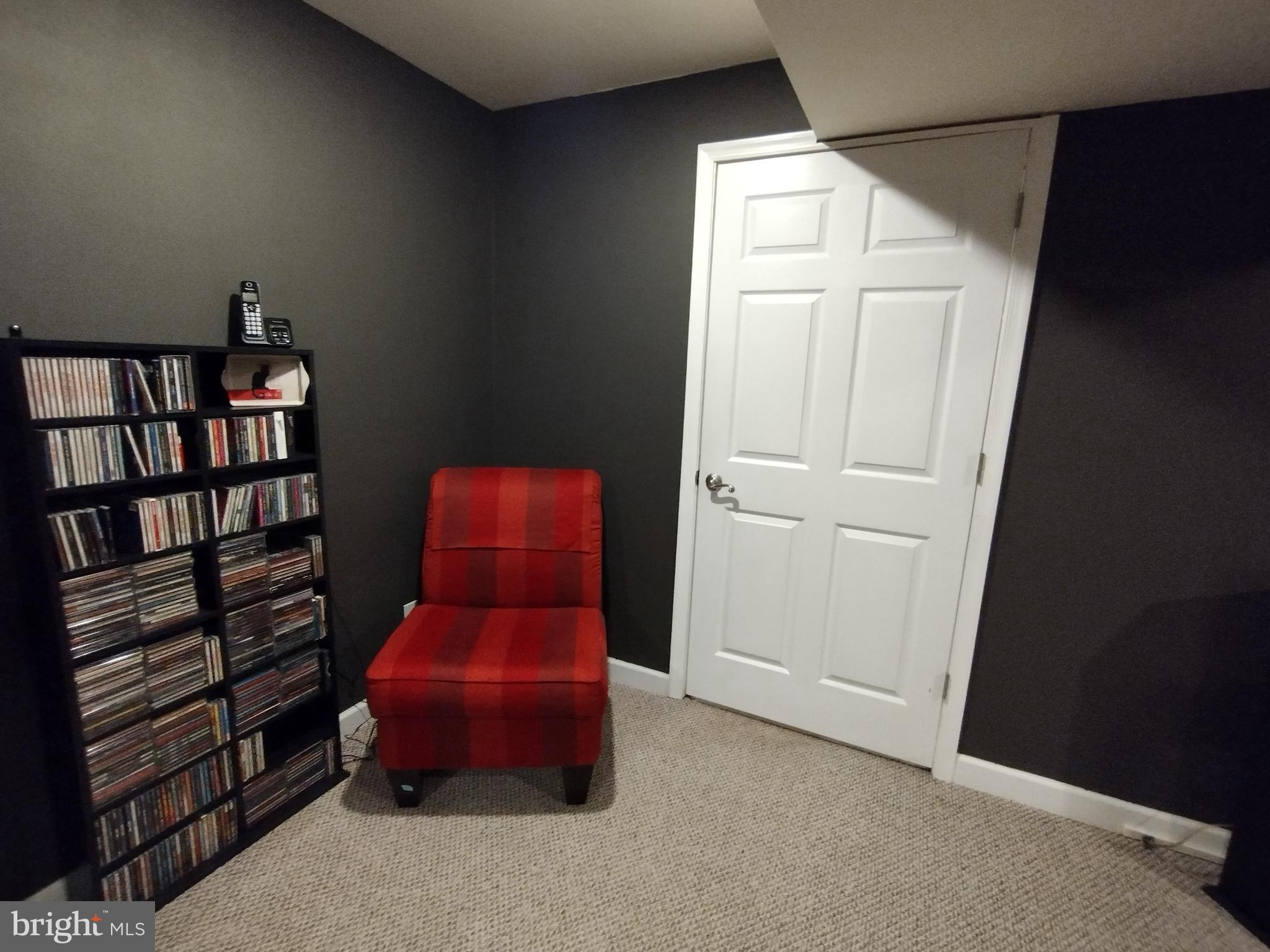 177 Raft Court Inwood, WV 25428 - Photo 31 of 40 a hallway with a book shelf