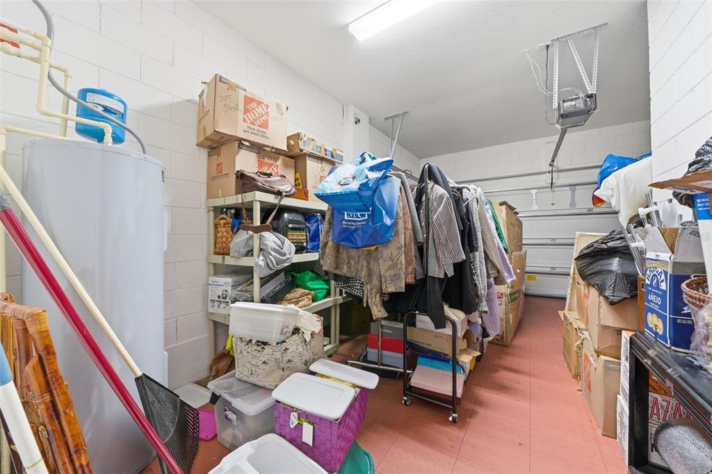 3461 Fallbrook Drive Kissimmee, FL 34759 - Photo 29 of 43 a view of walk in closet with clothes and shoes