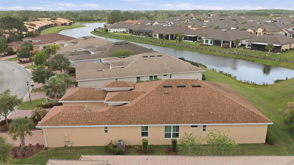 3461 Fallbrook Drive Kissimmee, FL 34759 - Photo 34 of 43 an aerial view of residential houses with outdoor space and river